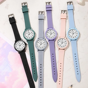 Minimalist quartz watches with silicone straps in six pastel colors and date display window
