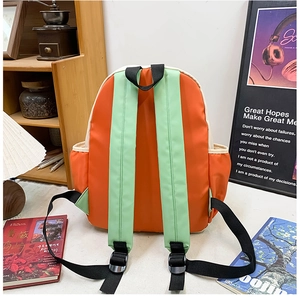 Close-up of contrast color school backpack with waterproof fabric and side pockets