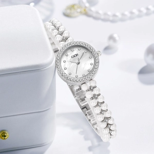 Montre à Quartz Élégante Pour Femmes Lunette En Strass Cadran En Nacre Bracelet Double Künstliche Perles De Culture
