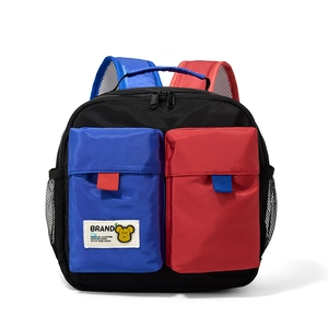 Detail of color-block kids backpack with durable nylon fabric and mesh side pockets