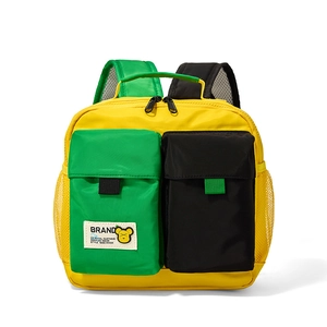 Detail view of colorful kids backpack with double front pockets and side mesh storage