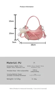Pink mini crossbody bag featuring pearl heart charm and sweet bow knot detail