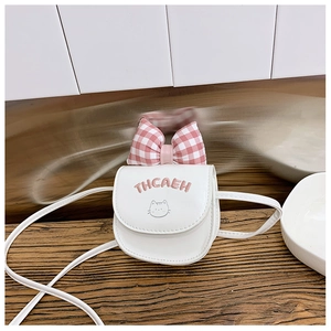Close-up of white PU leather kids crossbody bag with pink plaid bow and cat embroidery
