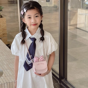 Mini pink crossbody bag for kids with a red plaid bow and stylish letter embossing