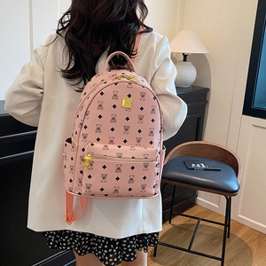 Pink faux leather backpack with bear prints and monogram pattern for women