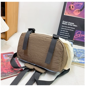 Detail view of the durable nylon material and wide bottom of the kids' backpack