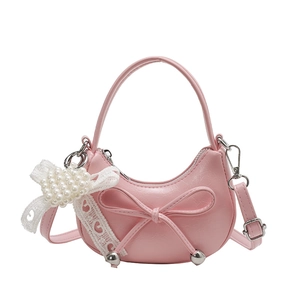 Pink crescent handbag with pearl bow pendant and adjustable PU leather shoulder strap