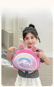 Close-up of pink toddler backpack featuring cute rabbit motif and strawberry 3D ears