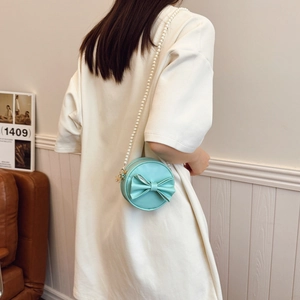 Sac bandoulière vert menthe pour fille avec nœud et bandoulière en perles