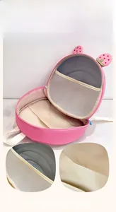 Detail of pink toddler backpack showing large capacity and internal mesh compartments