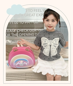 Close-up of pink EVA hardshell cartoon backpack with rainbow swirls and cute rabbit motif