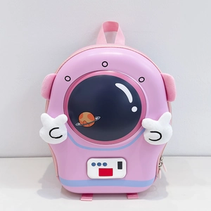 Close-up of pink hardshell astronaut backpack with transparent window and plush hands
