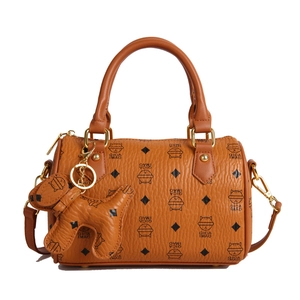 Fashionable brown kitty print boston bag with leather texture and cute puppy charm