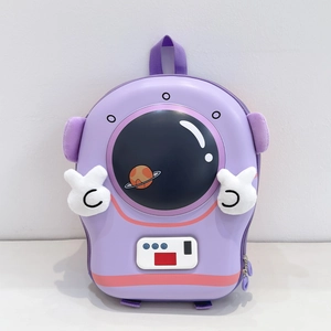 Close-up of cute purple astronaut kid's backpack featuring 3D visor and plush robot hands