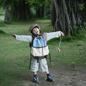 Kids outdoor backpack set with drawstring bag and tactical vest in forest scenery