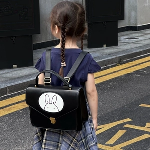 Retro black leather kids backpack featuring a cute white rabbit design and gold hardware
