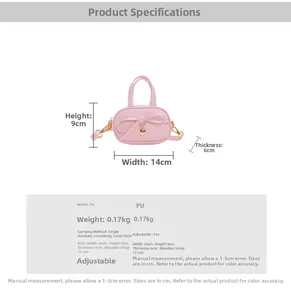 Pink mini crossbody bag for kids with bow decoration and size specification chart