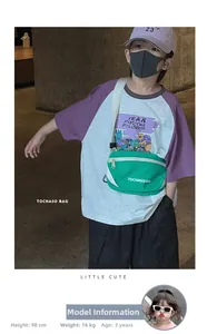 Grüne Nylon-Bauchtasche für Kinder mit weißer TOCHASO BAG-Aufschrift und verstellbarem Gurt