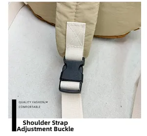Detail of adjustable shoulder strap buckle and durable nylon fabric on children chest bag