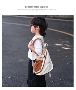 Detailed view of the KLTS side logo on a nylon contrast color kids chest bag outdoors