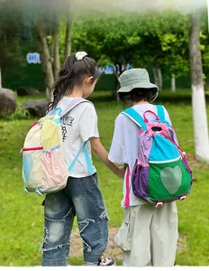 Detail of color-block drawstring backpack with heart mesh pocket and adjustable straps