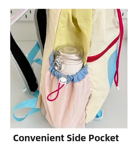 Detail of convenient side pocket with drawstring toggle on a colorful kids backpack
