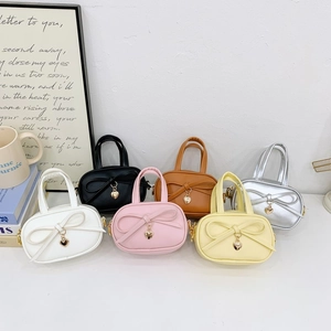 Kids Girls Mini PU Leather Crossbody Bag Sweet Bowknot Heart Pendant Handbag Solid Color Adjustable Strap