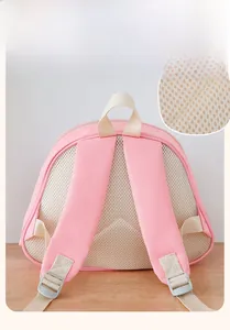 Pink child backpack detail showing breathable honeycomb mesh back and straps