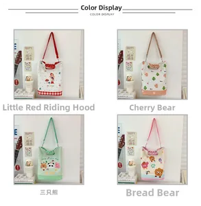 Detailed view of four cartoon canvas crossbody bags in cherry, bear, and red hood prints