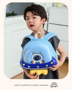 Blue UFO hardshell backpack for kids featuring cute space theme and plush yellow stars
