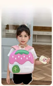 Toddler backpack with strawberry cake design and matching butterfly coin purse charm