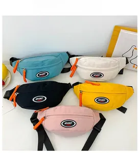 Detailed display of colorful kids canvas chest bags with sport fashion label and orange zip puller