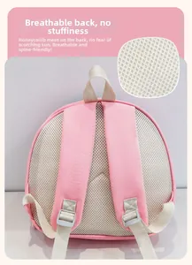 Pink kids backpack featuring breathable honeycomb mesh back and padded shoulder straps