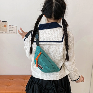 Kids sporty nylon chest bag in teal with orange zippers and adjustable strap for boys and girls
