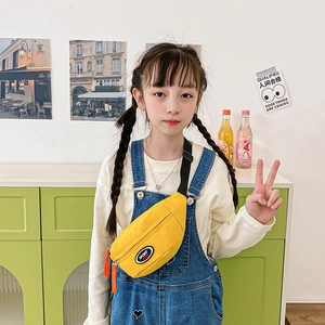 Kids bright yellow nylon chest bag with sport logo and adjustable black strap for travel
