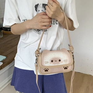 Cute cartoon cat crossbody handbag for women with kitten pattern and kitten paw details