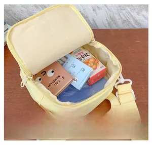 Internal view of a mini nylon crossbody bag showing spacious storage for daily items