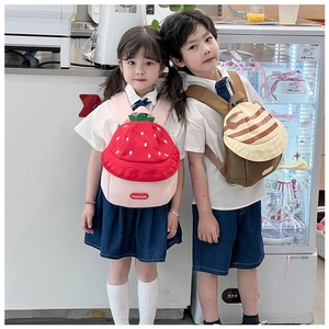 Detailed view of breathable mesh straps and strawberry house design on kids backpacks