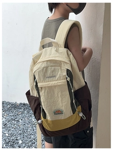 Détail du sac à dos TOCHASO pour enfants en nylon multicolore avec cordon de serrage