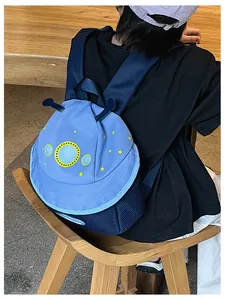 Blue kids space backpack with yellow stars and breathable mesh detail shown from the side