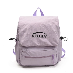 Lightweight lavender school backpack for children with front pocket and drawstring side details