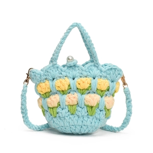 Handmade crochet mini tulip shoulder bag with pearl button and dual straps in blue