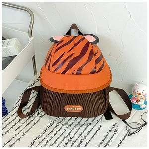 Detail view of the orange tiger toddler backpack with 3D ears and breathable mesh