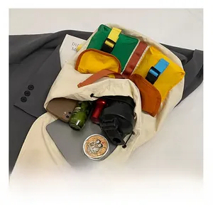 Detailed view of spacious school backpack interior with multi-color storage compartments