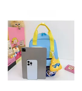 Cartoon airplane kids backpack size comparison shown with a tablet and smartphone