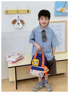 Deep blue and orange kids backpack with cute panda pattern and aircraft charm