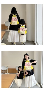 Front and back view of matching parent-child backpacks in vibrant color-block design