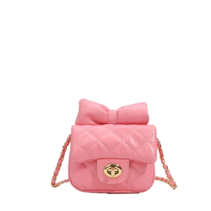 Pink quilted crossbody bag for girls with sweet bow detail and gold chain strap