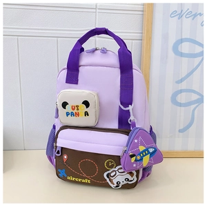 Detail view of purple kids backpack with cute panda pouch and airplane themed accessories