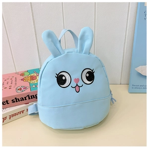 Detail of cute rabbit ears and embroidery on light blue canvas kids backpack